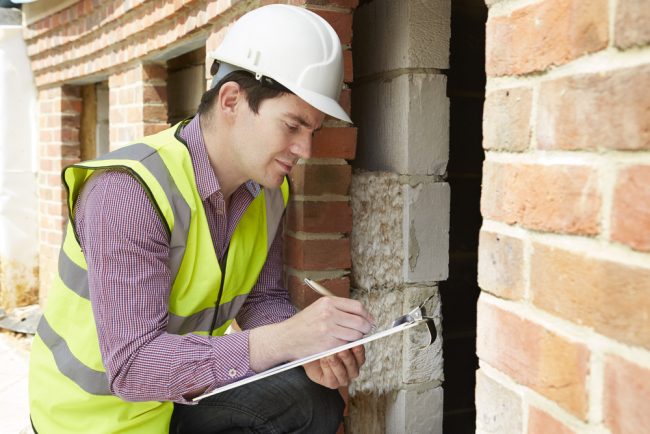 Professional stone masonry repair assessment of damaged wall in Cincinnati | Oberer Construction Company Professional stone masonry repair assessment of damaged wall in Cincinnati